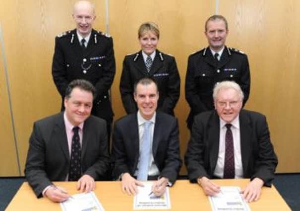 Herts crime commissioner David Lloyd and chief constable Andy Bliss with Beds counterparts Olly Martins and Colette Paul, and Sir Graham Bright and Simon Parr of Cambs