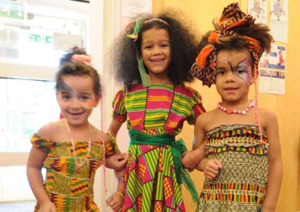 Food Festival at Heath Lane Nursery Hemel Hempstead. From left, Olivia Mboma three, Grace Mboma seven and Felicity Mboma four, were representing Zambia.