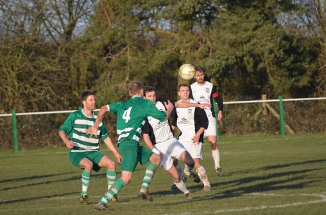 Action from Kings Langley's win over Holmer Green