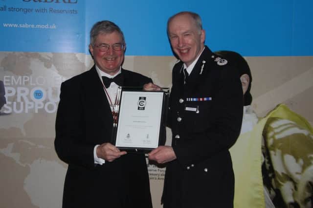 Chief Constable Andy Bliss receives Ministry of Defence award on behalf of Herts Police PNL-150128-141217001