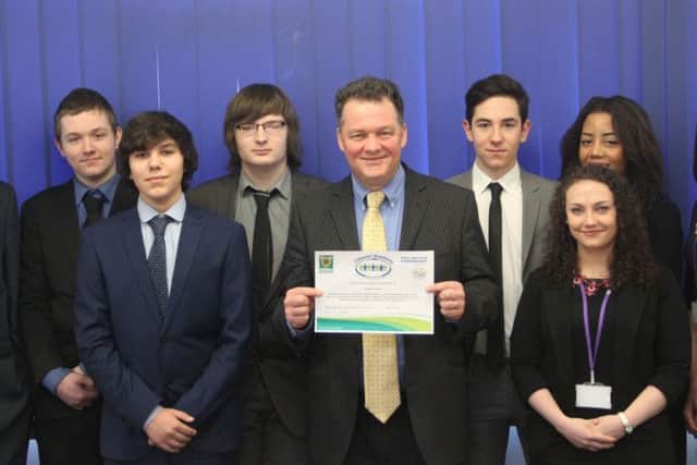 Police and Crime Commissioner for Hertfordshire, David Lloyd, with pupils from Cavendish School