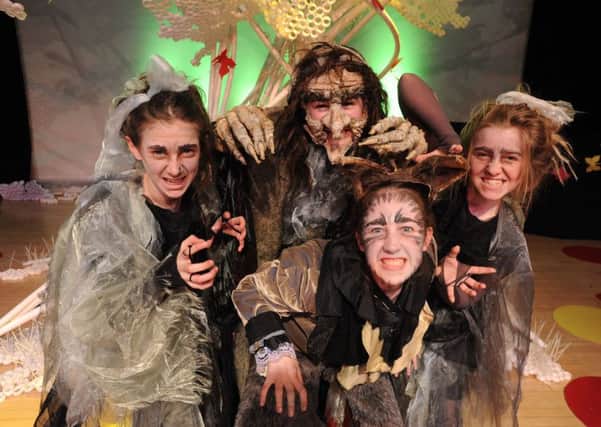 Into the Woods at Abbot's Hill School. Witches and wolves, from left, Kitty Roberts, Georgie Shelley, Alice Johnston and Emma Hackett