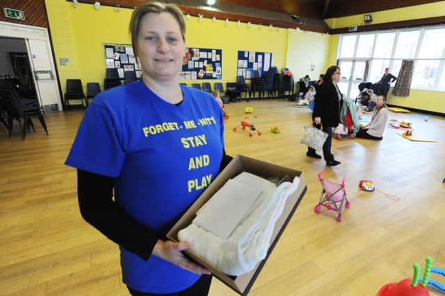 Deniece Colley and a Forget Me Not memory box at Grovehill Community Centre