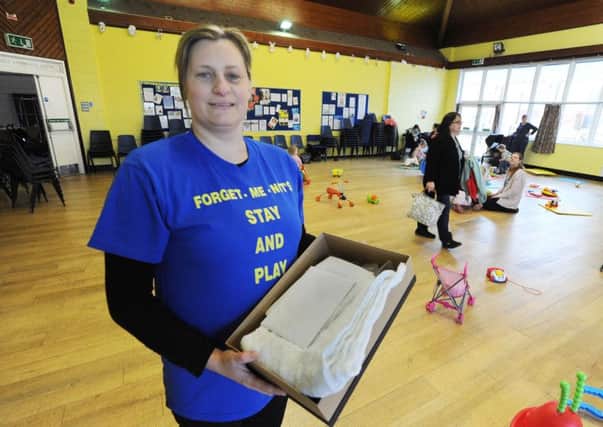 Deniece Colley and a Forget Me Not memory box at Grovehill Community Centre