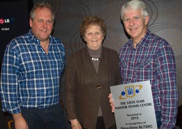 Mike Hawkes, left, and Sue Wolstenholme congratulate Steve Elms after 23 years as chairman of Berkhamsted Lawn Tennis and Squash Rackets Club