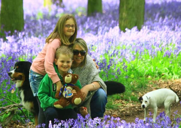 Lysa Campbell with step-children James and Eleanor Holdstock and dogs Bella and Reuben.