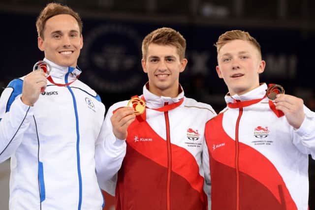 Max Whitlock, centre, won gold at the Commonwealth Games in Glasgow last year. Picture (c) PA Wire/Press Association Images