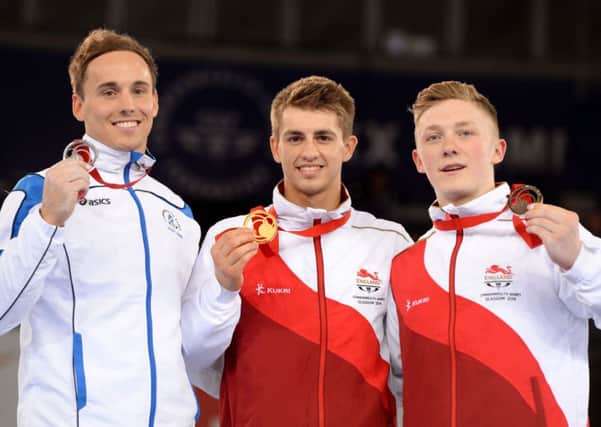 Max Whitlock, centre, won gold at the Commonwealth Games in Glasgow last year. Picture (c) PA Wire/Press Association Images