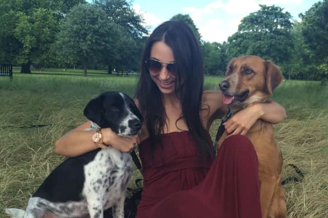 Shoshanna Mitchell with her dogs Bonbon, left, rescued from Thailand and Ozzie, right, from Italy