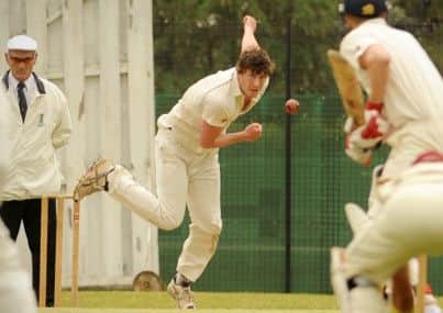 Owen Edwards bowling for Rugby CC