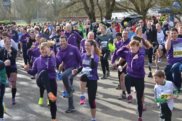 Runners jouned in with a group warm-up. Picture (c) David Brown