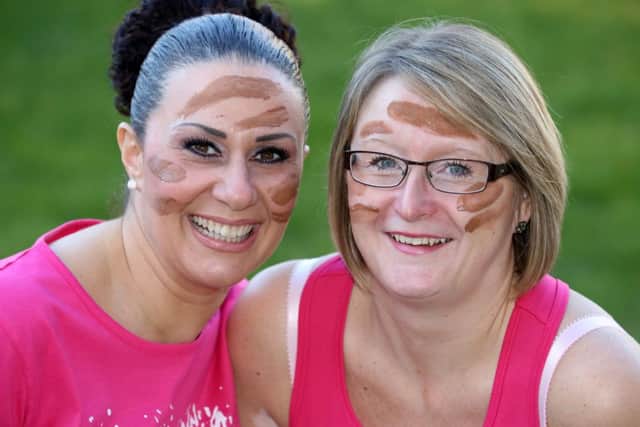 Carmela Cook with Pretty Muddy partner Samantha Jackson.