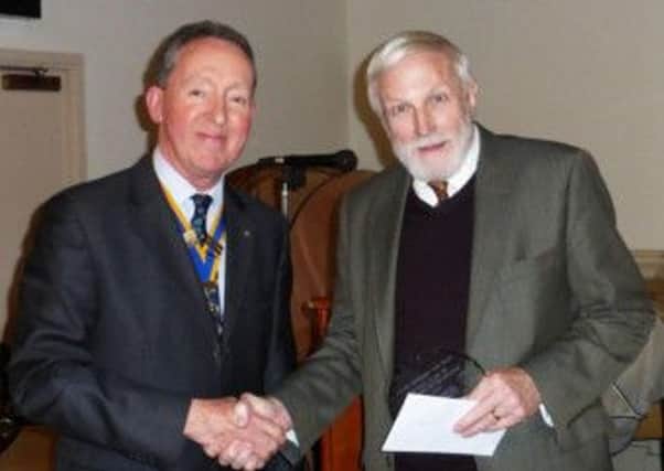 David Pearce receiving the  Berkhamsted Community Award from Rob Fernyhough, President of the Rotary Club of Berkhamsted Bulbourne. Picture by Berkhamsted Living.