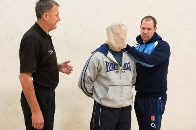 Spit guards are being rolled out by Herts Police