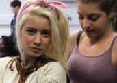 Sarah-jane Eyles gets strapped in to a straitjacket for her shocking stunt