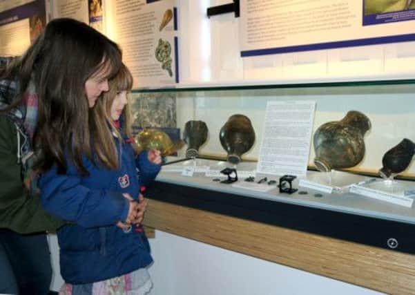 Tring Local History Museum has got three new displays, including Roman pots that were recovered from Cow Roast.