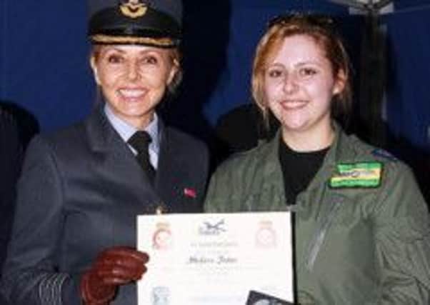 Cadet Warrant Officer Stefanie Forster of 2457 (Tring) squadron Air Training Corps is on cloud nine after recently completing the Air Cadet Pilot Scholarship at Tayside Aviation, Dundee where she was presented with her wings by Air Cadets Ambassador Honorary Group Captain Carol Vorderman.