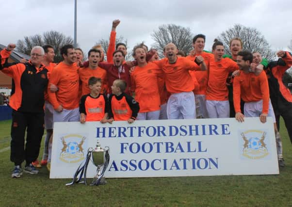 Echoes FC celebrate their victory at The County Ground