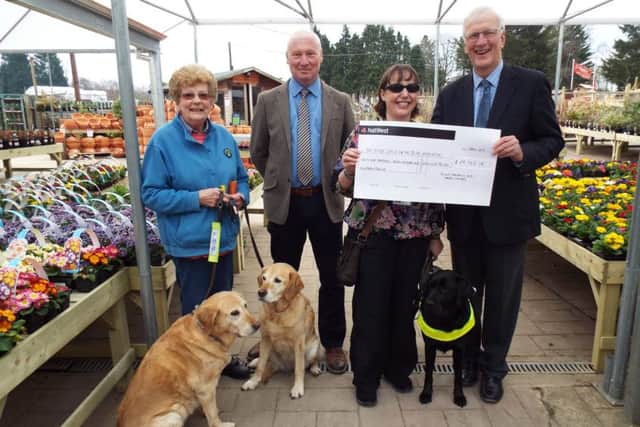 Cheque presentation to the Guide Dogs For The Blind from Hillier Garden Centres.