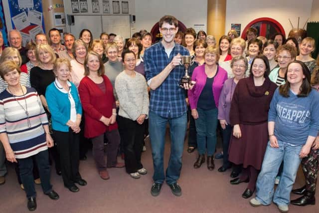 Musical director Ben Crawley with Kings Langley Community Choir.