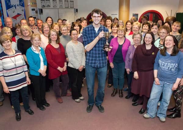 Musical director Ben Crawley with Kings Langley Community Choir.