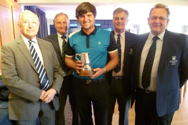 Luke Johnson, centre, won The Berkhamsted Trophy for the second year in succession