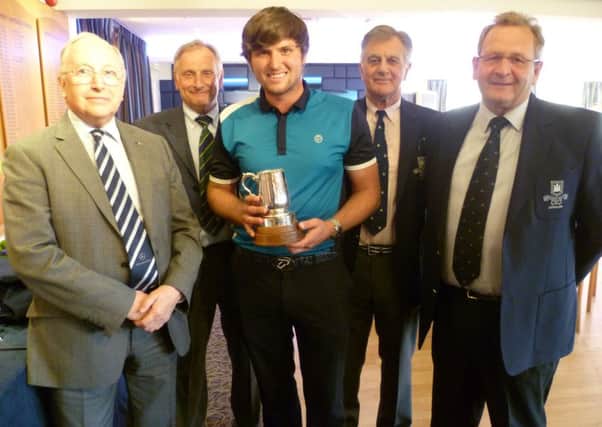Luke Johnson, centre, won The Berkhamsted Trophy for the second year in succession