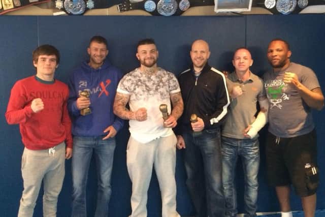 Mmax Gym, pictured from left: cornerman and professional fighter Ed Arthur, Wez Crane, Bobby Fielding, Mark Gibbings, team mate Jim Wyatt and coach Denniston Sutherland.