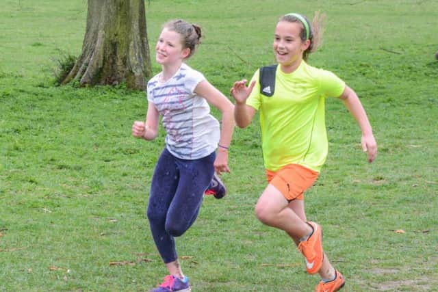 Junior Tring parkrunners Megan Savage and  Lucy Winter enjoyed a close finish