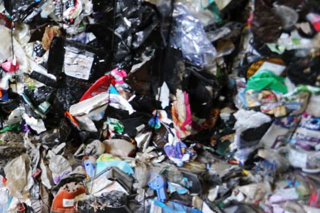 The waste inside the Materials Recycling Facility in Ford SUS-150413-173320001