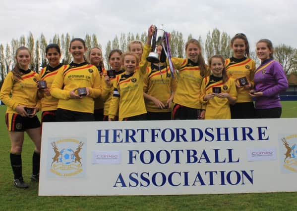 Watford Ladies Harts celebrate their cup win. Picture (c) Callum Riley