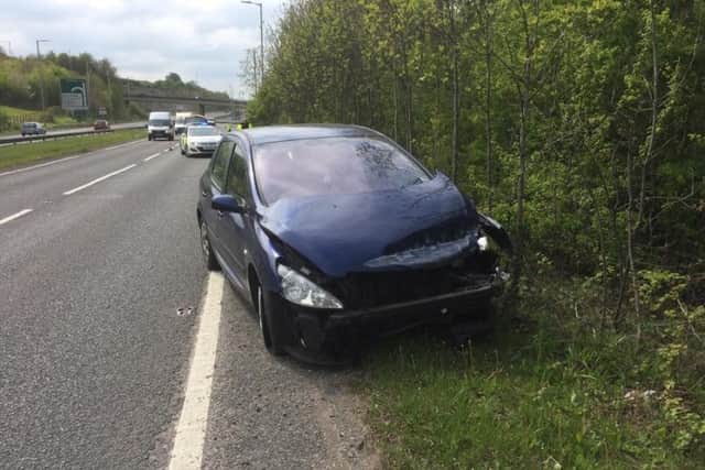 The Peugeot 307 after the crash on the A41 on Saturday afternoon
