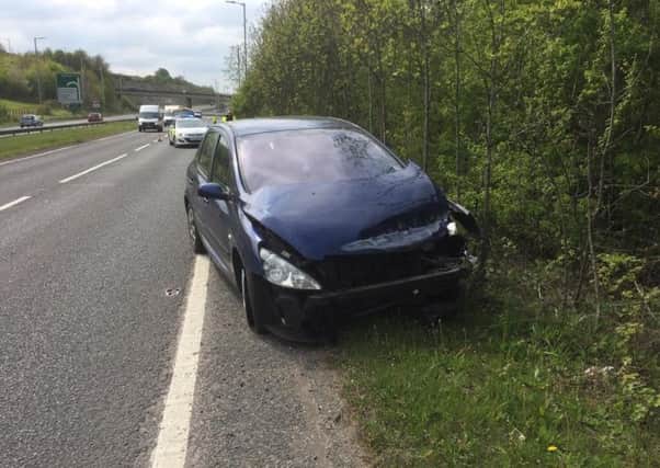The Peugeot 307 after the crash on the A41 on Saturday afternoon