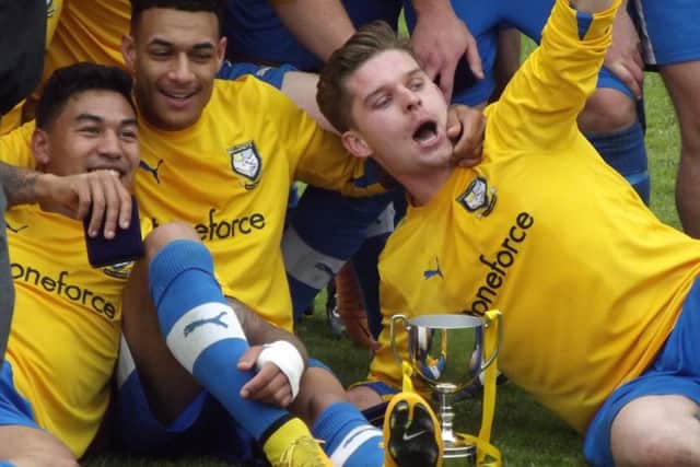 Berkhamsted celebrate their cup win. Picture (c) Dave Mason