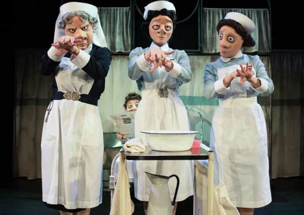 Nursing Lives, full mask production by Vamos Theatre