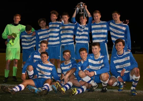 Comets Dolphins U18 celebrate their Herts County Cup win. Picture (c) Barry Brook
