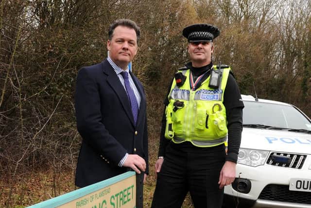 PC Brian Evans with Police and Crime Commissioner David Lloyd PNL-150220-165105001