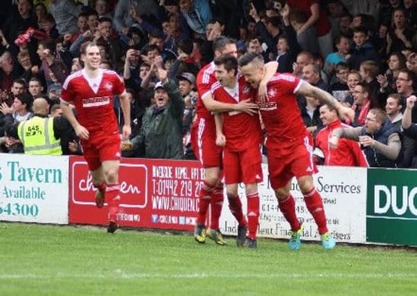 Hemel Hempstead Town celebrate Ben Mackey's leveller against Sutton United. Picture (c) Tony Conway