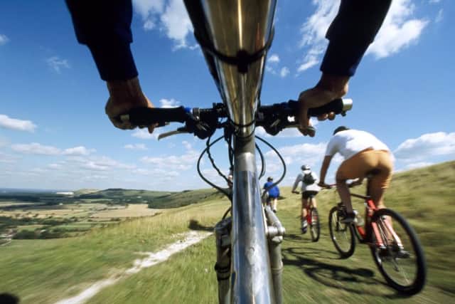 Close-up of cyclists on mountain bikes at Edburton Escarpment, at Devil's Dyke Estate. "Model Released"JPET Winchester City Mill