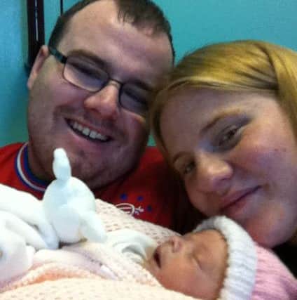 The Kerr Family. Danny Kerr, Samantha Charles-Kerr and baby Lexi.