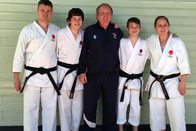 The successful black belt canditates with worldwide chief instructor Malcolm Phipps 8th Dan