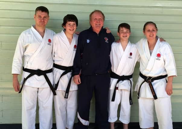 The successful black belt canditates with worldwide chief instructor Malcolm Phipps 8th Dan