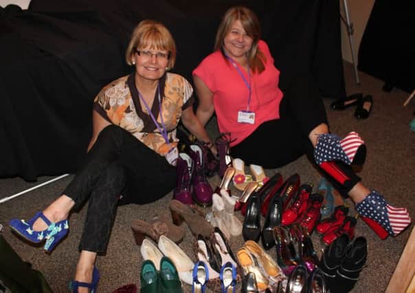 Rennie Grove district retail managers Michelle Remice and Lisa Collinson with their grooviest shoes