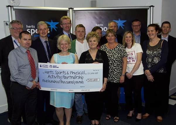 The Healthy and Active in Herts project was presented with a cheque for £500,000 at the Herts Sports and Physical Activity Partnership AGM