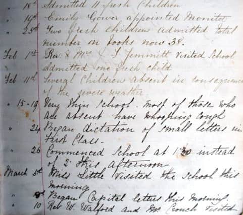 The log book from 1895, which documents the goings on at the school when it was in the town centre