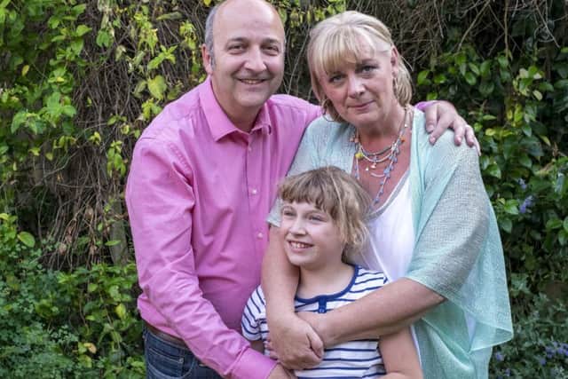 David and Lucy Leveson with daughter Katy, 10.
Picture by Steve Blogg.