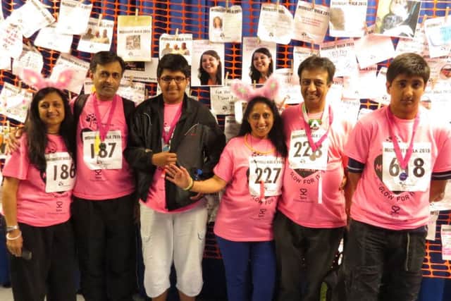 Team VAH at the end of the Midight Glow Walk in aid of the Hospice of St Francis. Photo by Nick Bright.