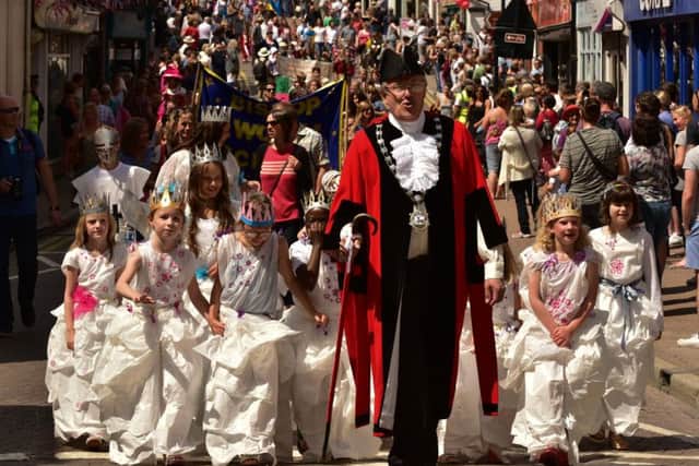 Tring town mayor Stephen Hearn leads the carnival procession along the High Street to Pound Meadow, June 2015. Photo by Steve Kitchener. PNL-150630-150109001