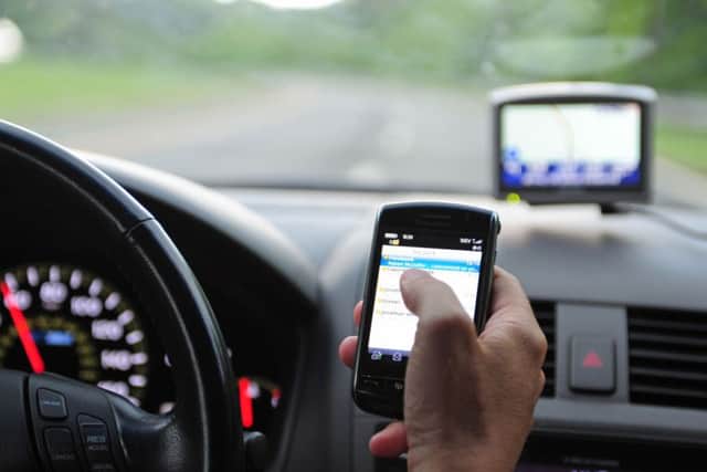 Police will be clamping down on motorists who use their mobile while behind the wheel.