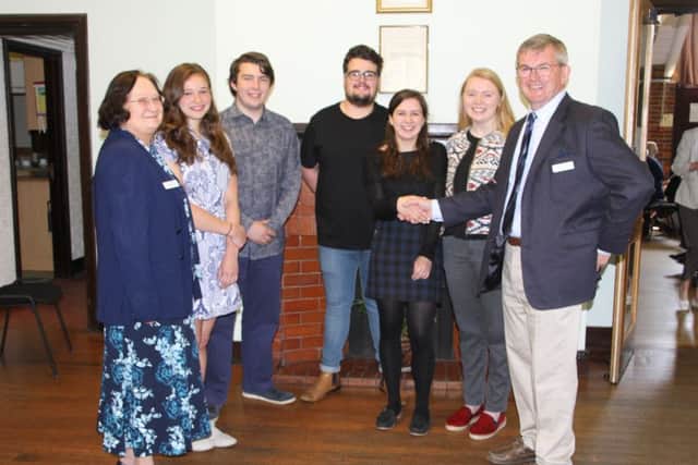 Pam Langdon-Pratt, left, and Chris Roythorne, right, with the young people